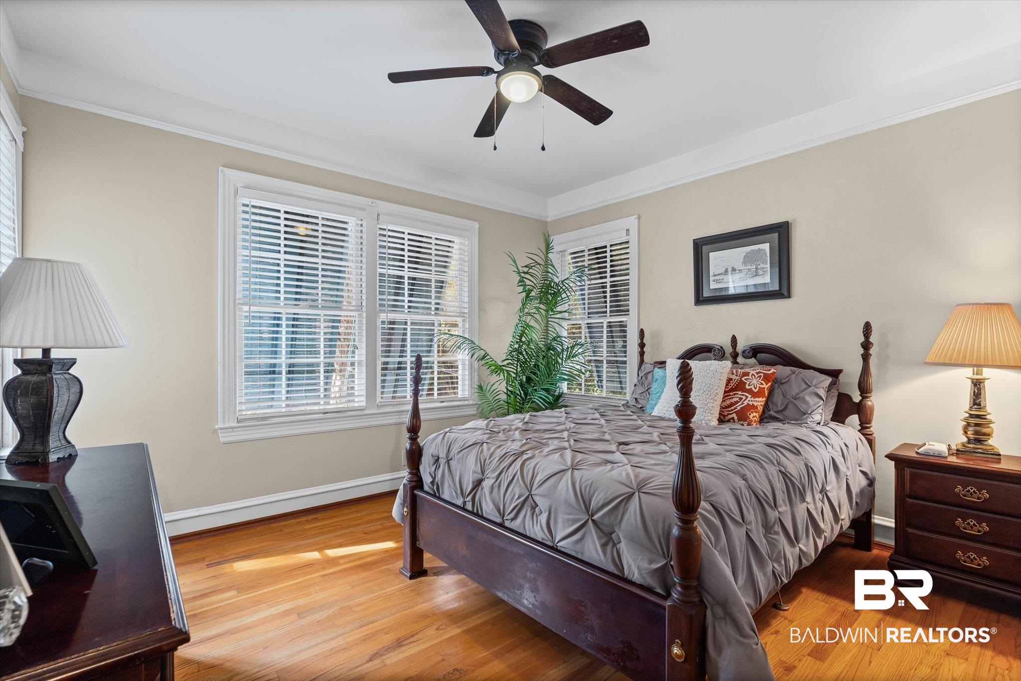 7015 Bay Road Mobile, AL 36605 - Photo 37 of 53 Guest Cottage Bedroom with crown molding, light wood-type flooring, and ceiling fan