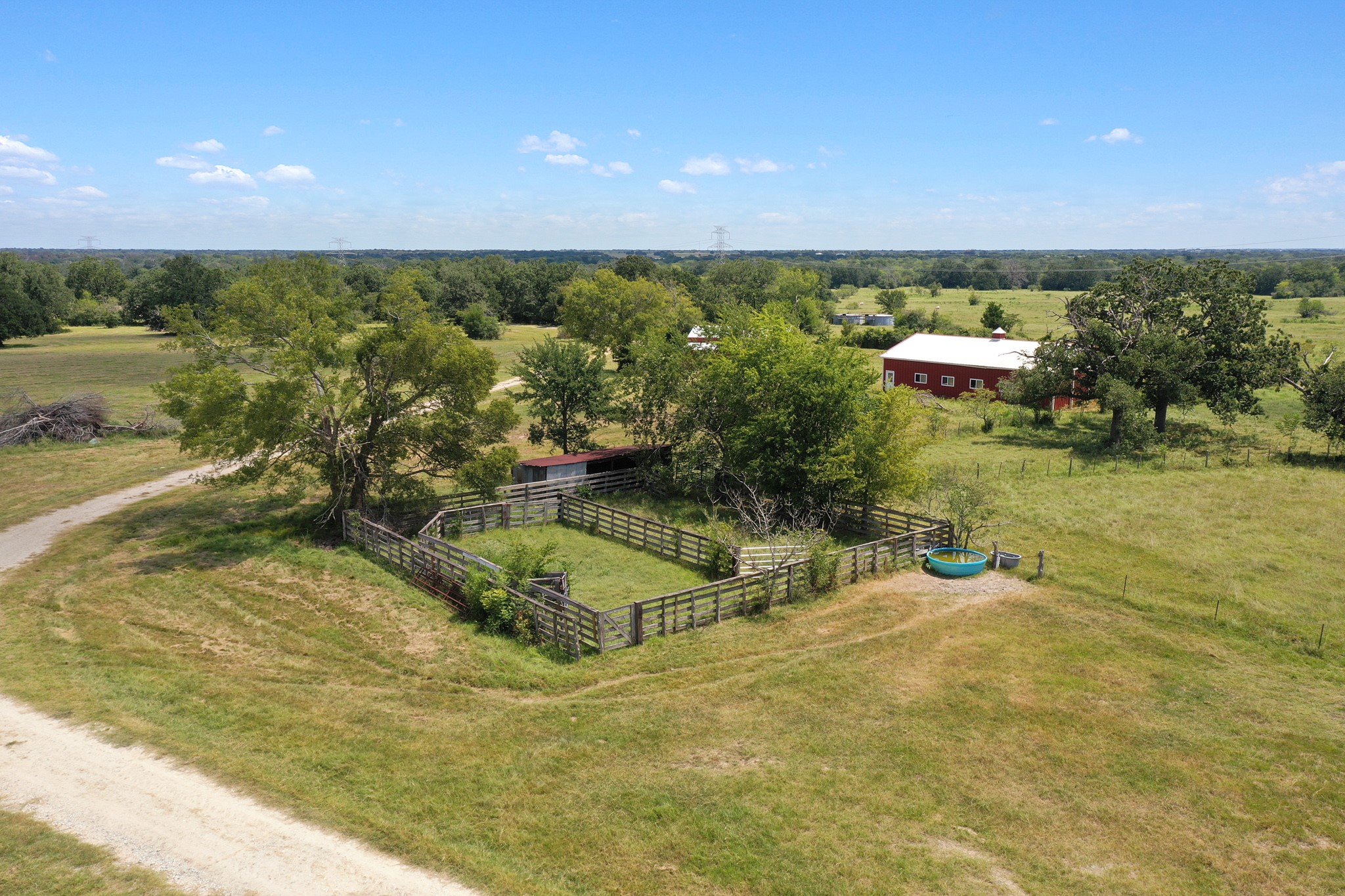 7808 Oxford Cemetery Road Madisonville, TX 77864 - Photo 12 of 16 a view of a swimming pool and an outdoor seating