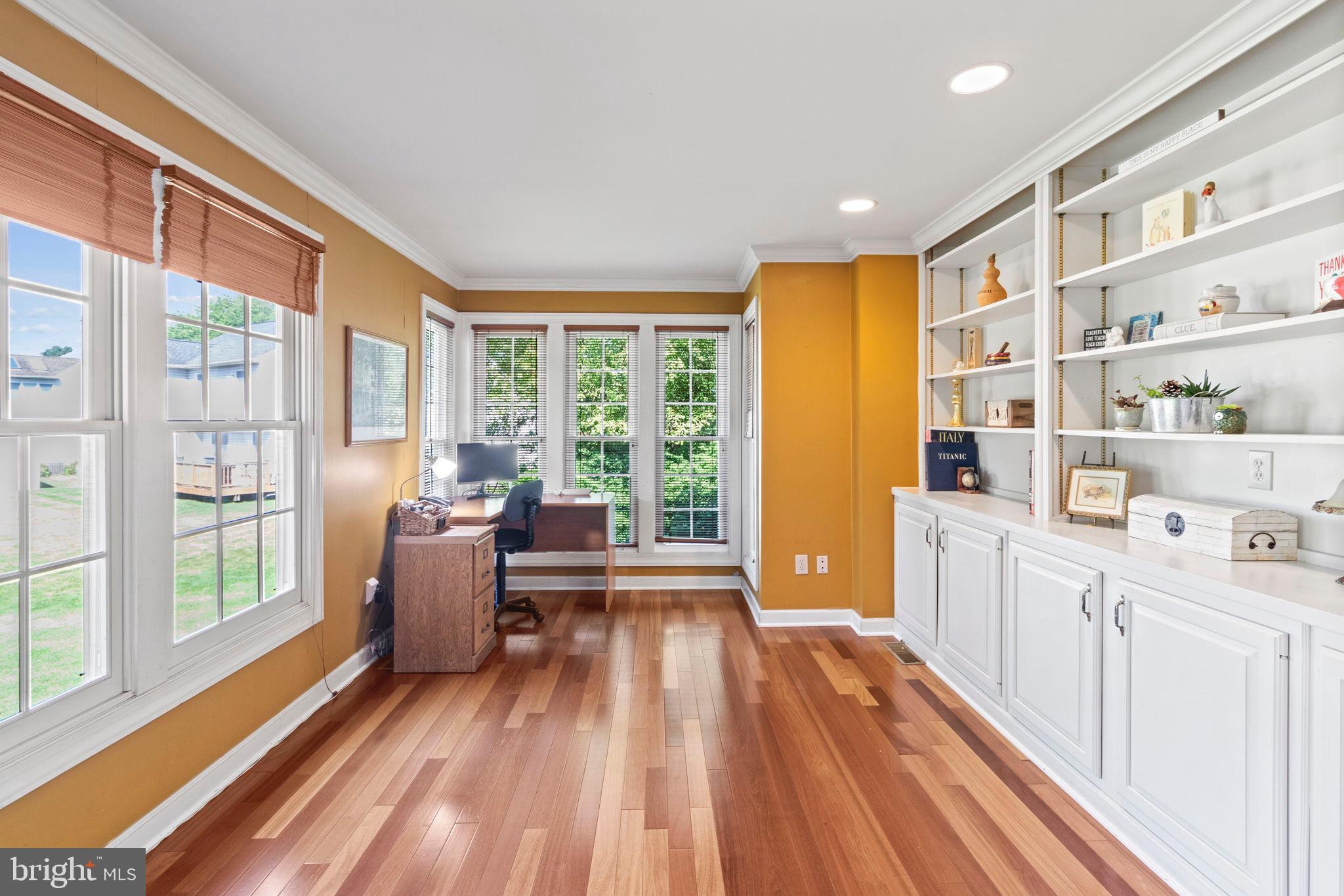 15 Byron Drive Mount Laurel, NJ 08054 - Photo 13 of 60 a view of a large room with wooden floor and windows