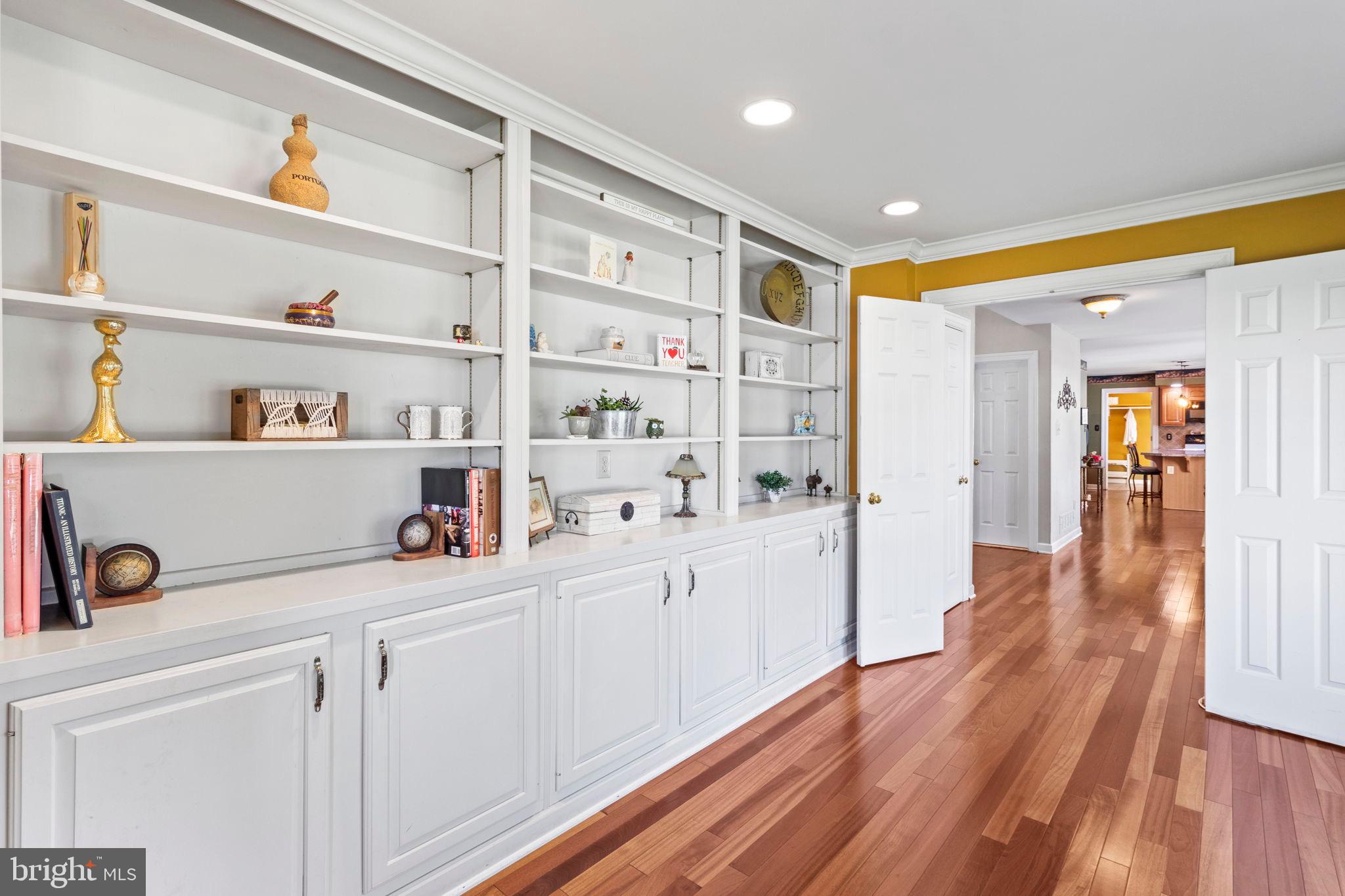 15 Byron Drive Mount Laurel, NJ 08054 - Photo 14 of 60 a hallway with cabinets and wooden floor