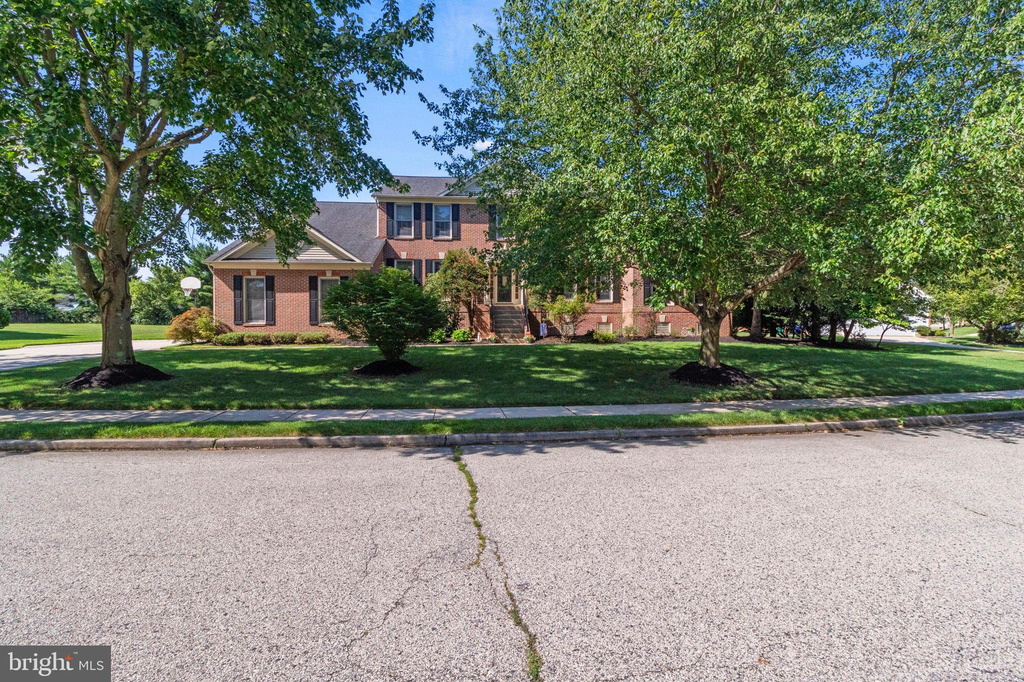15 Byron Drive Mount Laurel, NJ 08054 - Photo 2 of 60 a front view of a house with a yard and a garage