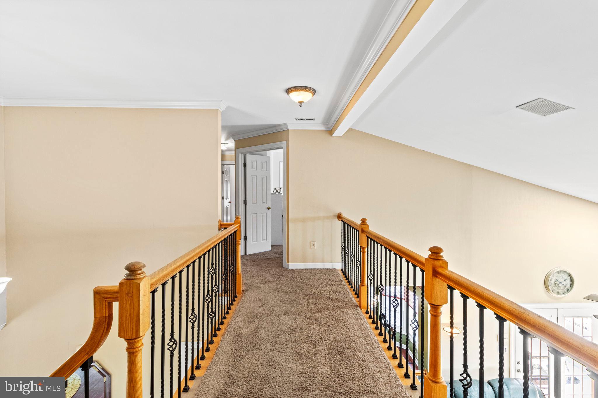 15 Byron Drive Mount Laurel, NJ 08054 - Photo 24 of 60 a view of a hallway with wooden floor and stairs