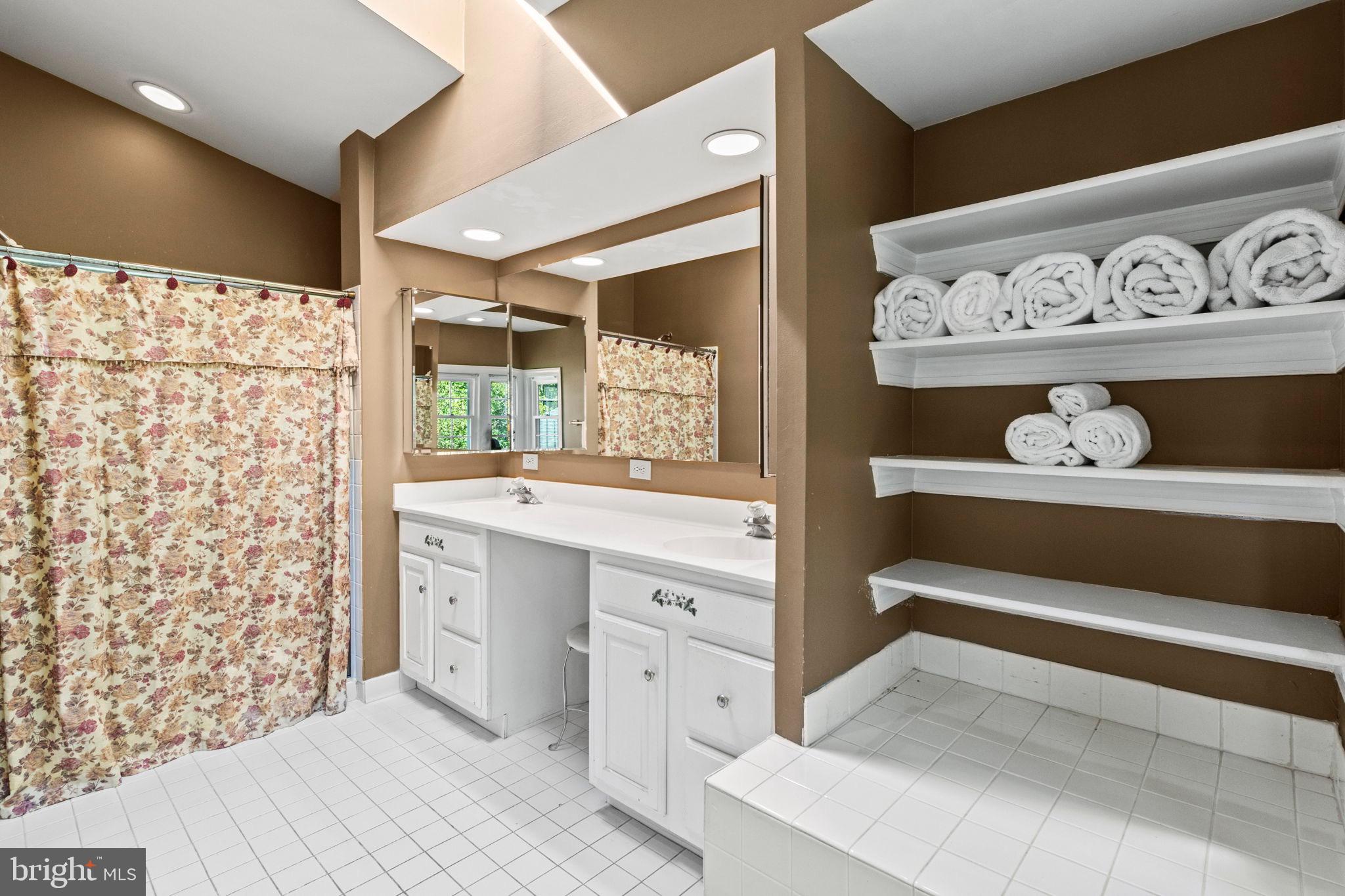 15 Byron Drive Mount Laurel, NJ 08054 - Photo 29 of 60 a bathroom with a sink and a mirror