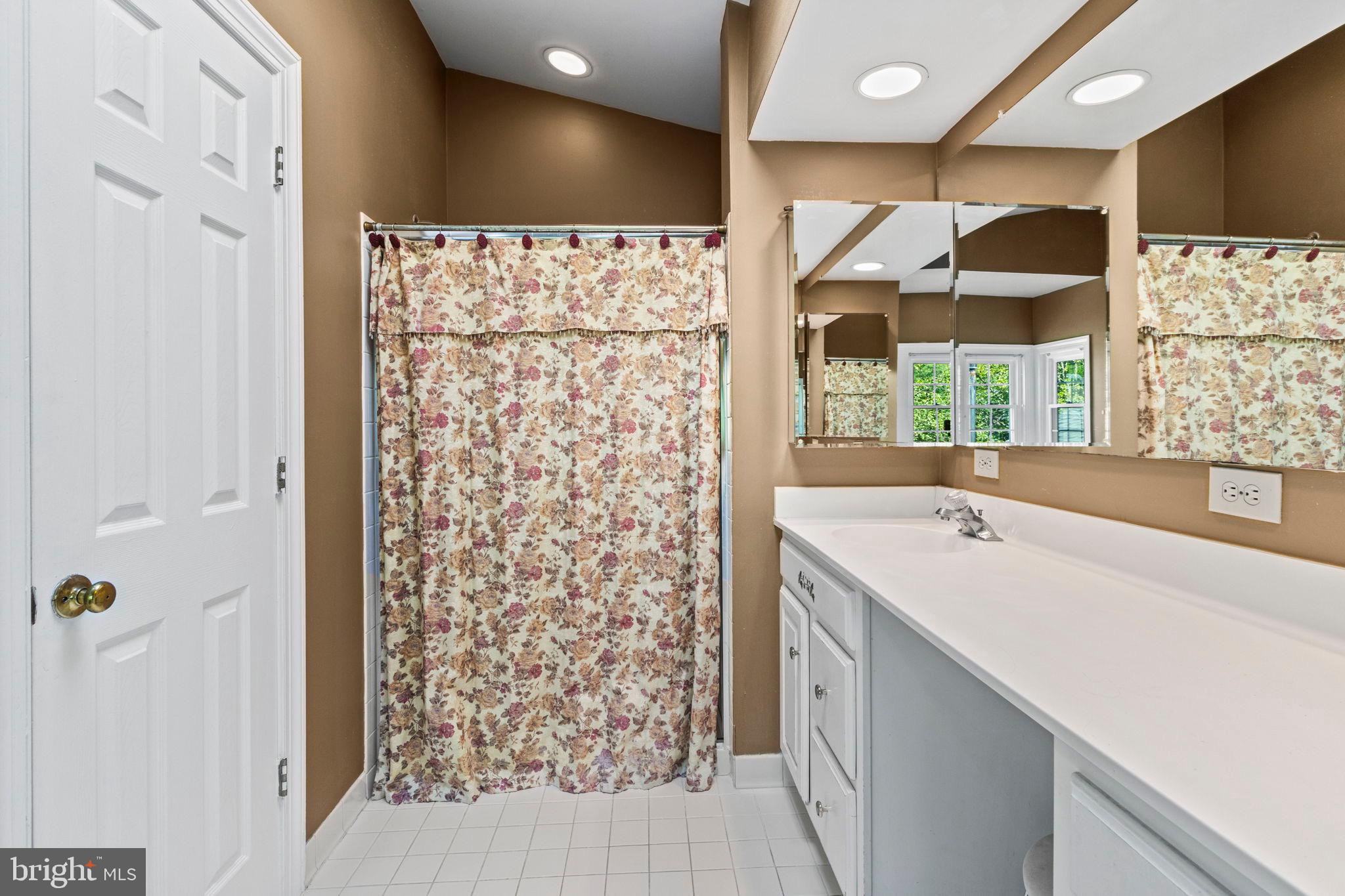 15 Byron Drive Mount Laurel, NJ 08054 - Photo 30 of 60 a bathroom with a double vanity sink and a large mirror