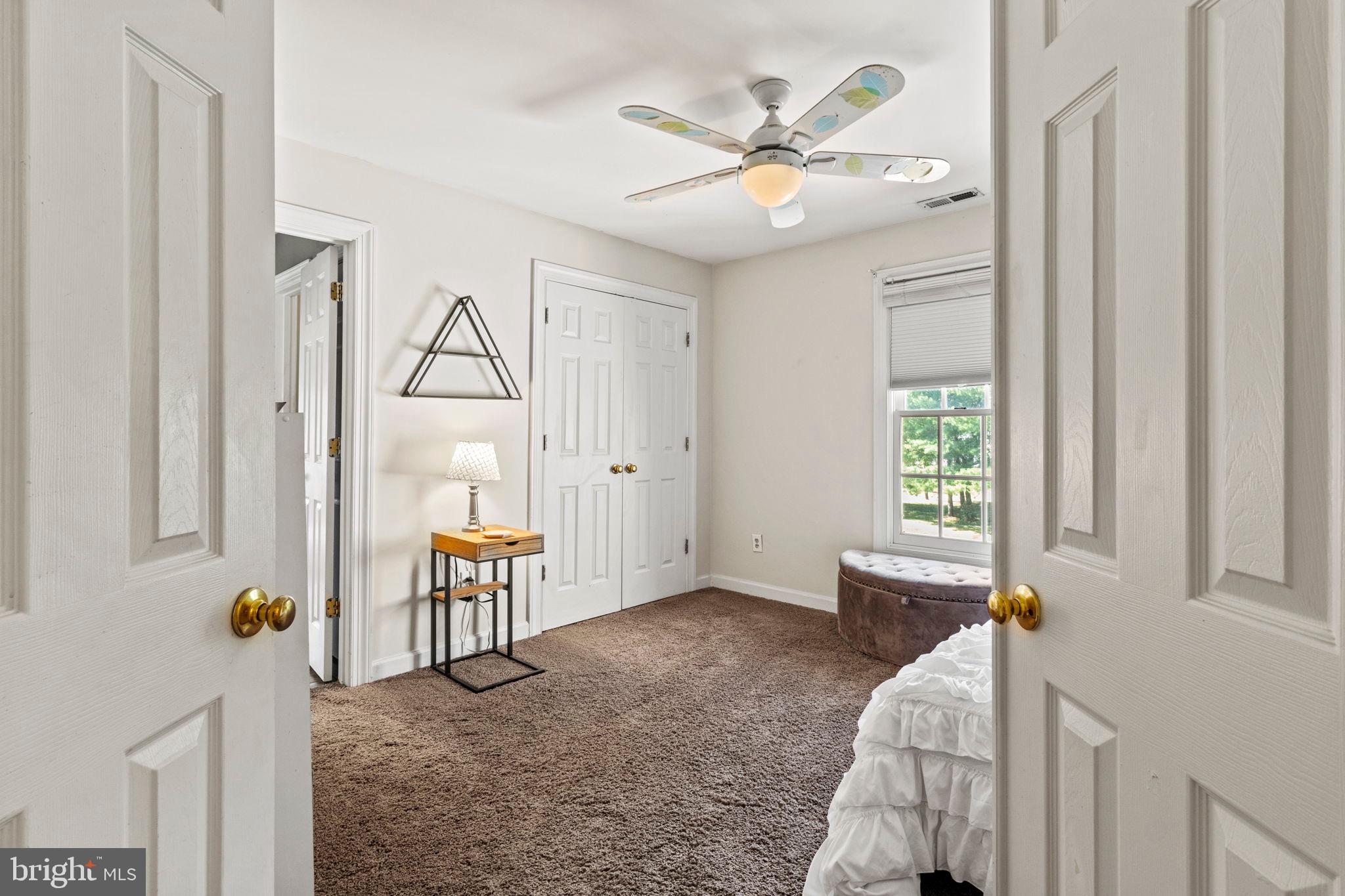 15 Byron Drive Mount Laurel, NJ 08054 - Photo 32 of 60 a living room with furniture and a window