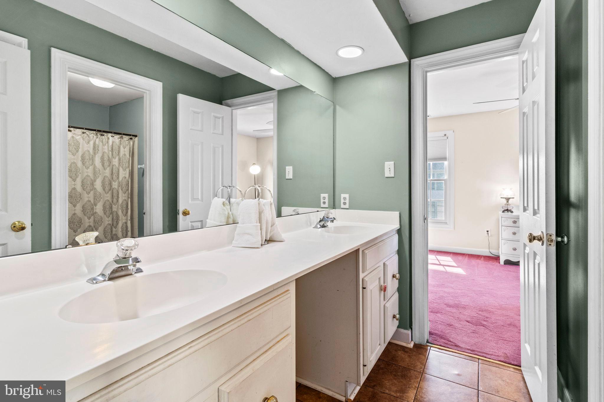 15 Byron Drive Mount Laurel, NJ 08054 - Photo 34 of 60 a en suite bathroom with a double vanity sink and a mirror