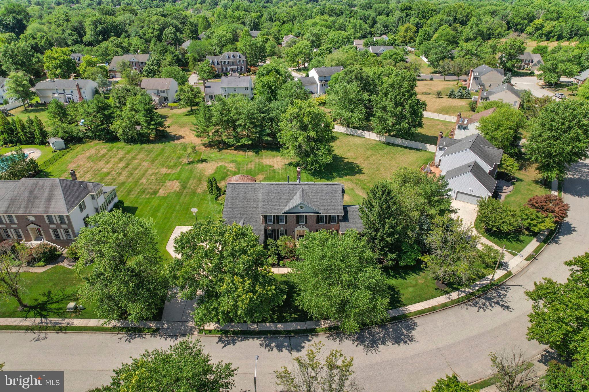 15 Byron Drive Mount Laurel, NJ 08054 - Photo 4 of 60 an aerial view of a house with a yard and lake view