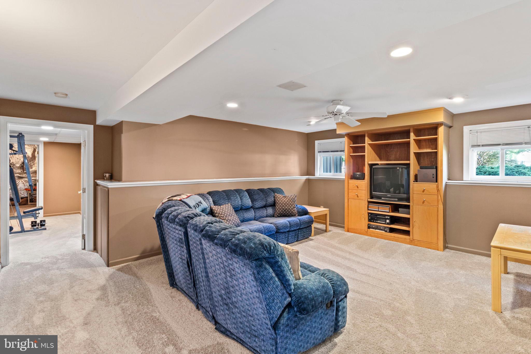 15 Byron Drive Mount Laurel, NJ 08054 - Photo 42 of 60 a living room with furniture and a flat screen tv