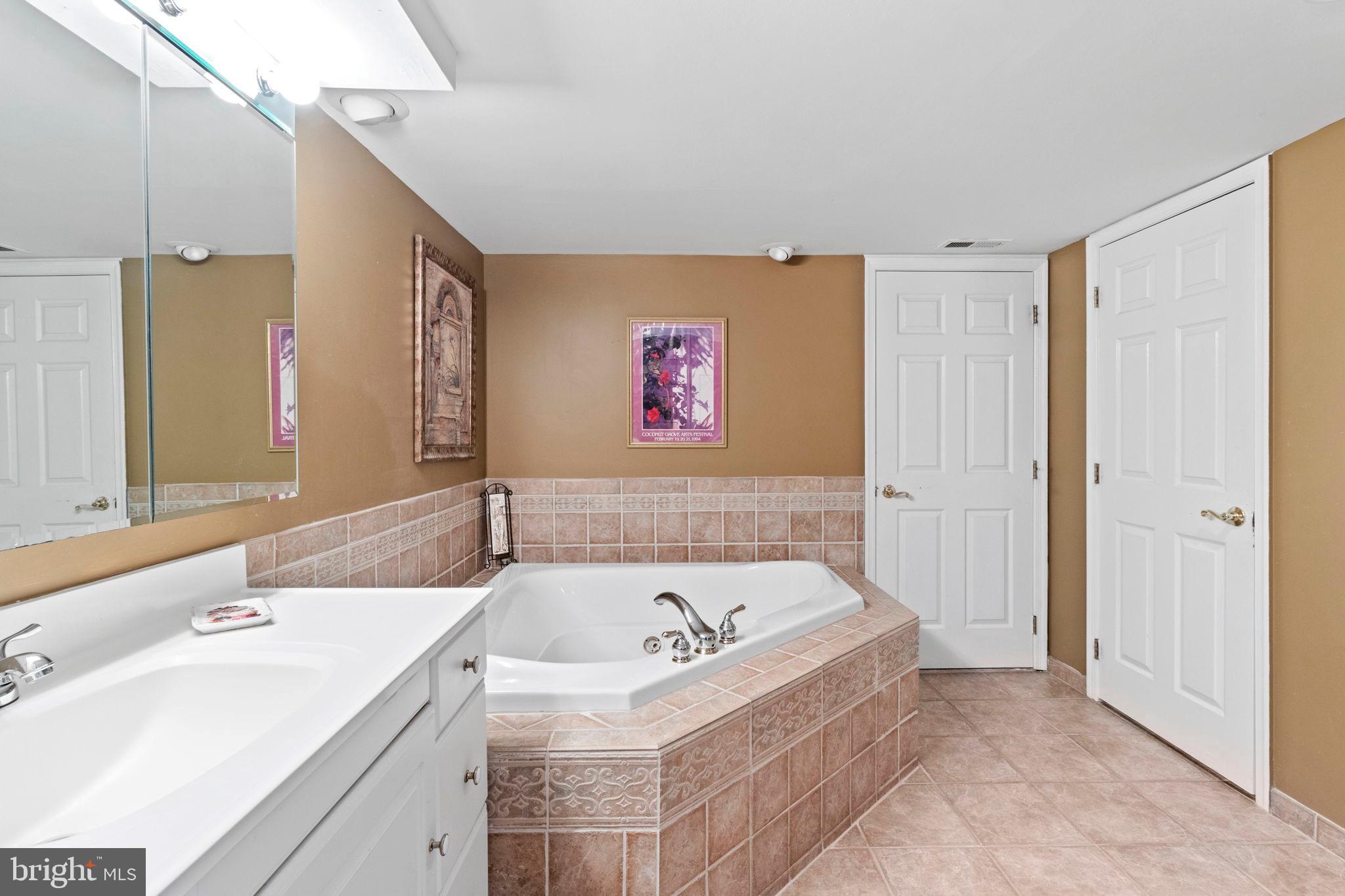 15 Byron Drive Mount Laurel, NJ 08054 - Photo 46 of 60 a bathroom with a bathtub and a sink