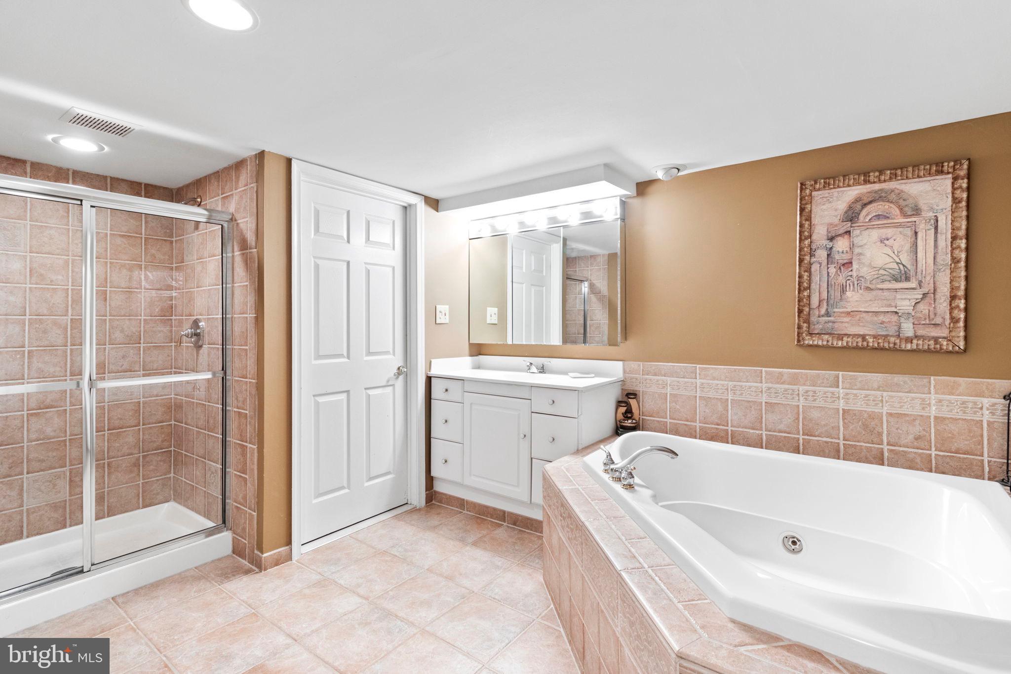 15 Byron Drive Mount Laurel, NJ 08054 - Photo 47 of 60 a bathroom with a bathtub and a shower