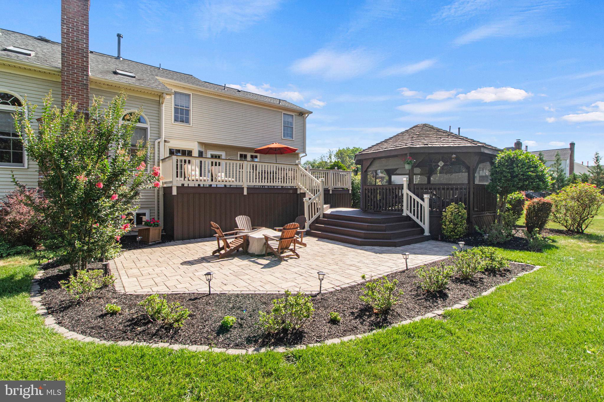 15 Byron Drive Mount Laurel, NJ 08054 - Photo 52 of 60 a view of a house with backyard sitting area and tub