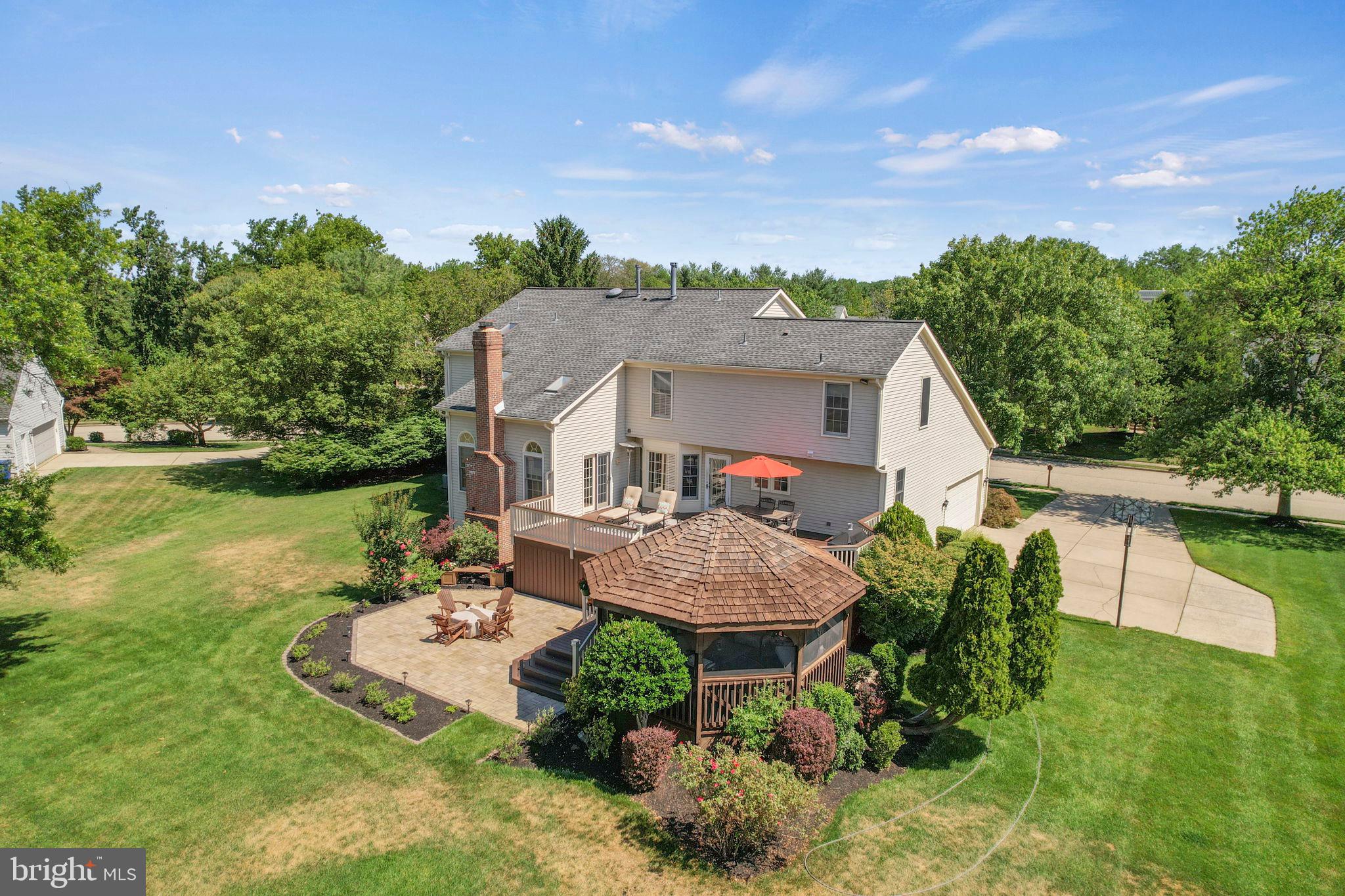 15 Byron Drive Mount Laurel, NJ 08054 - Photo 53 of 60 a view of a house with a yard patio and a garden
