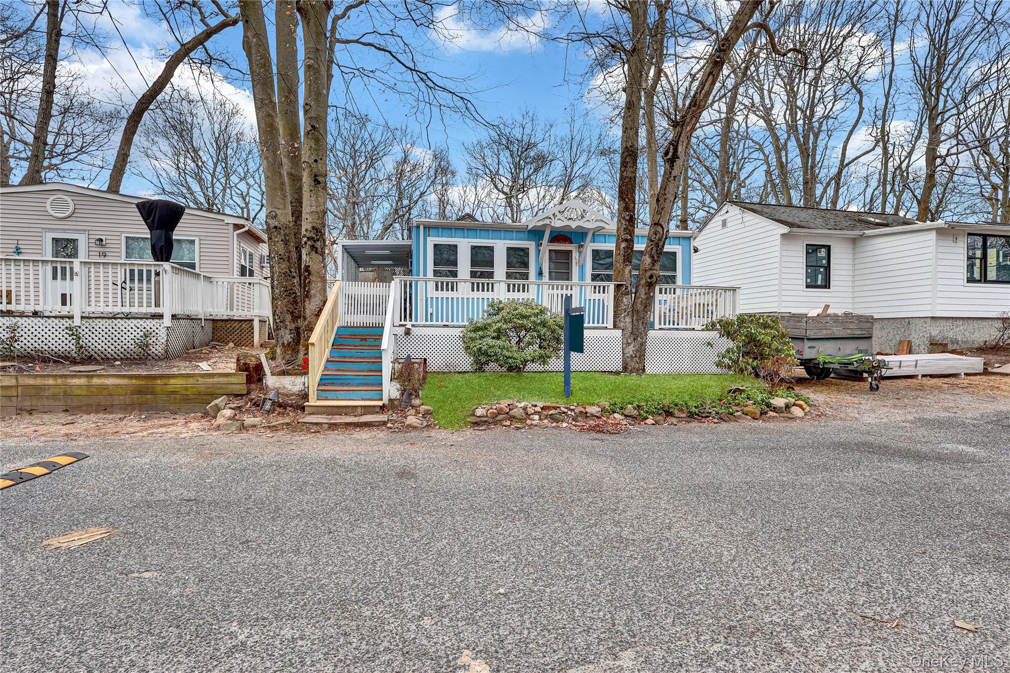 21 Cottage Road Baiting Hollow, NY 11933 - Photo 26 of 28 a view of a house with a street