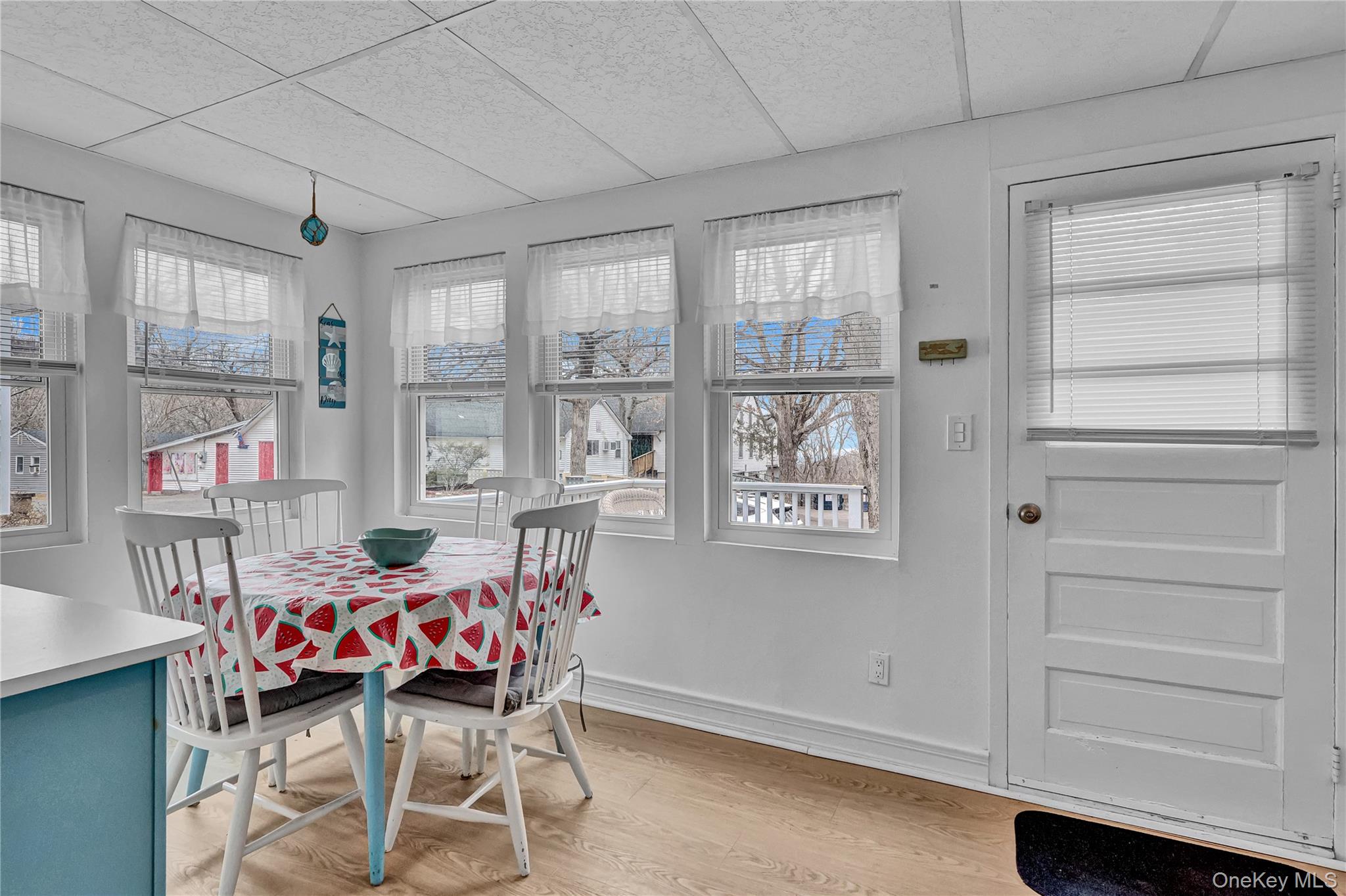 21 Cottage Road Baiting Hollow, NY 11933 - Photo 10 of 28 a room that has a dresser and a chair in it