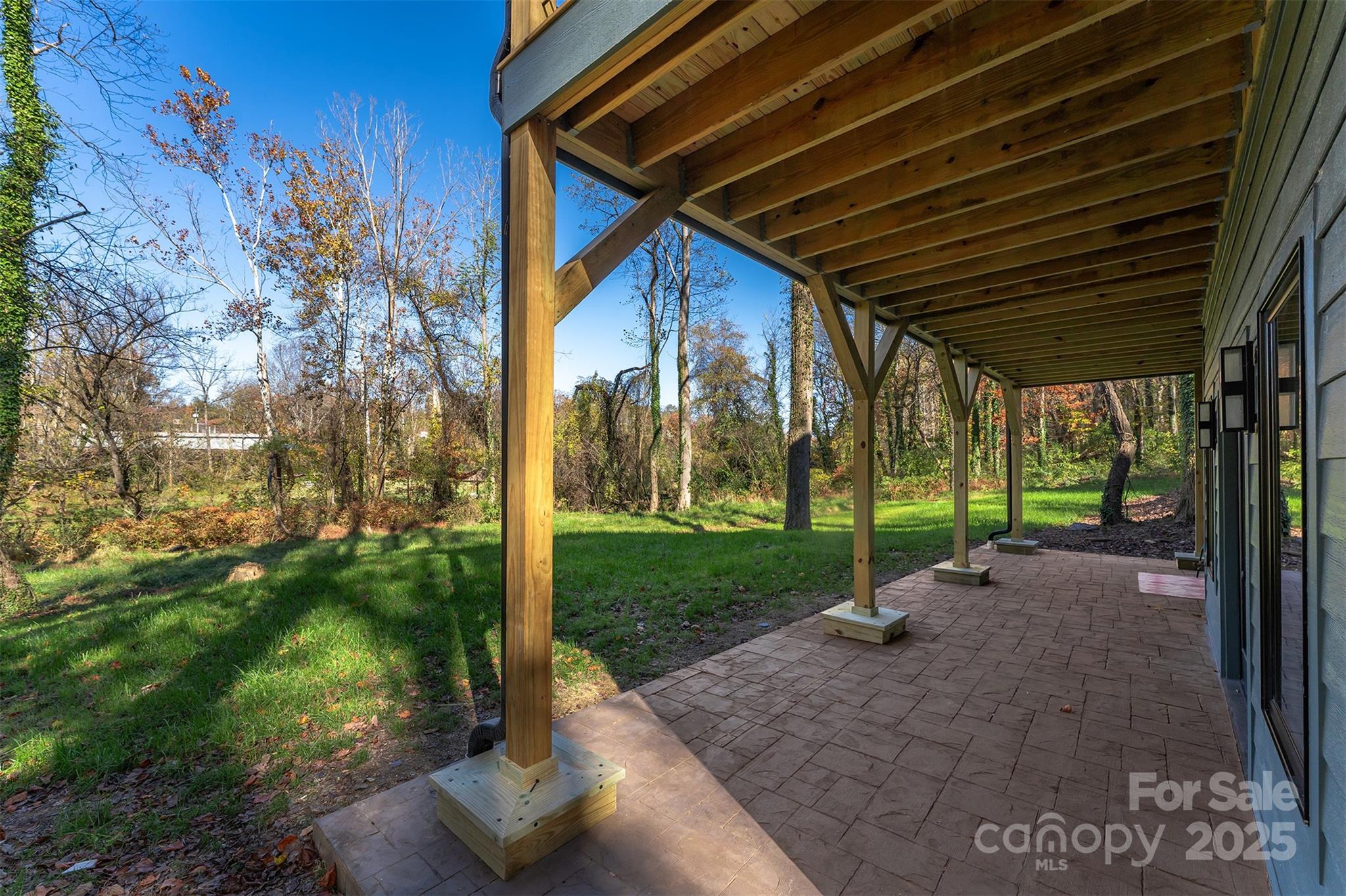 110 Providence Road Asheville, NC 28806 - Photo 34 of 36 a view of a patio with wooden fence