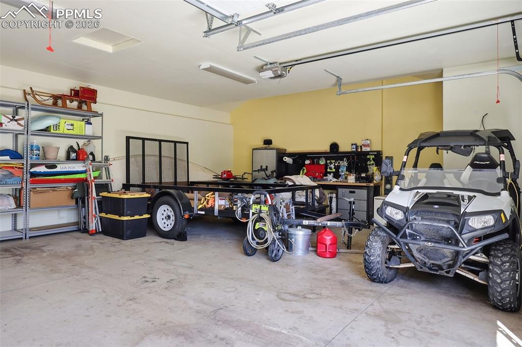 89 Ranch View Road Florissant, CO 80816 - Photo 41 of 50 2 1/2 car garage provides ample storage and a place for your hobby workshop.