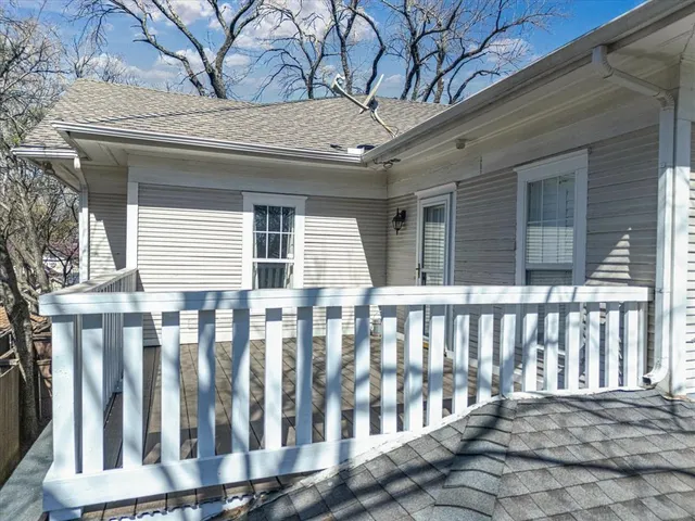 a porch with a bench