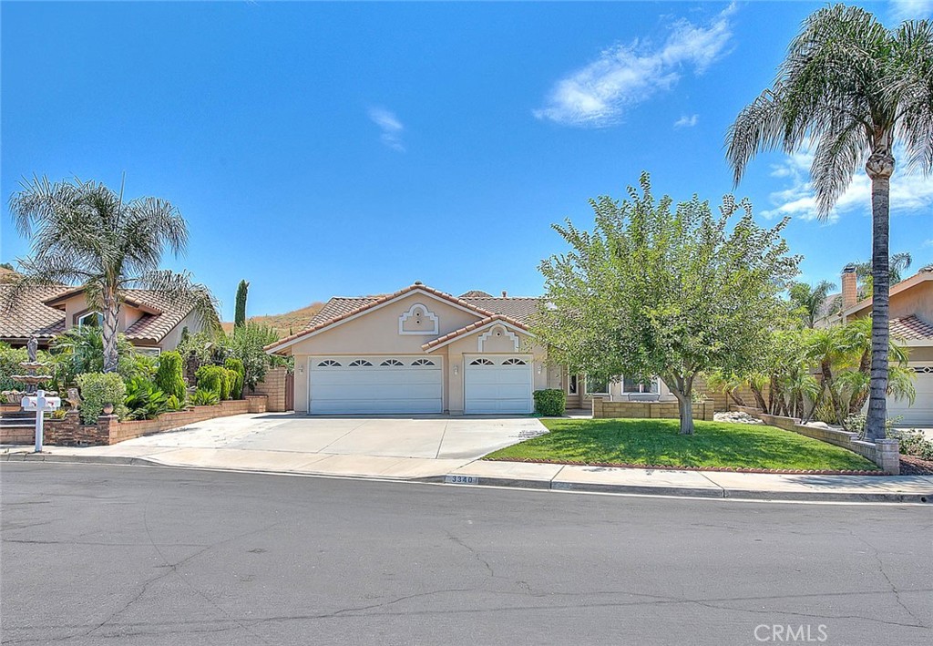 3340 May Court Riverside, CA 92503 - Photo 2 of 67 a house with a yard and a trees