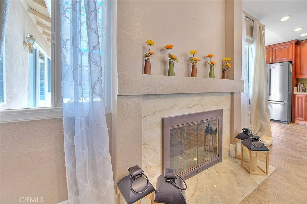 3340 May Court Riverside, CA 92503 - Photo 26 of 67 a living room with furniture and a fireplace