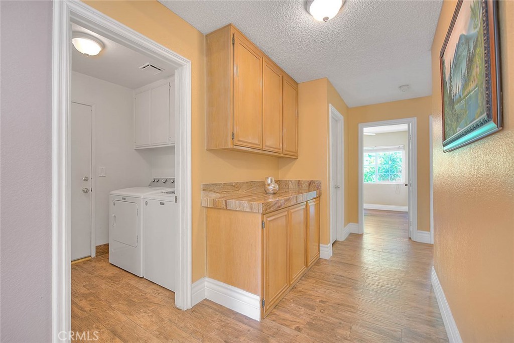 3340 May Court Riverside, CA 92503 - Photo 28 of 67 a view of a hallway with wooden floor