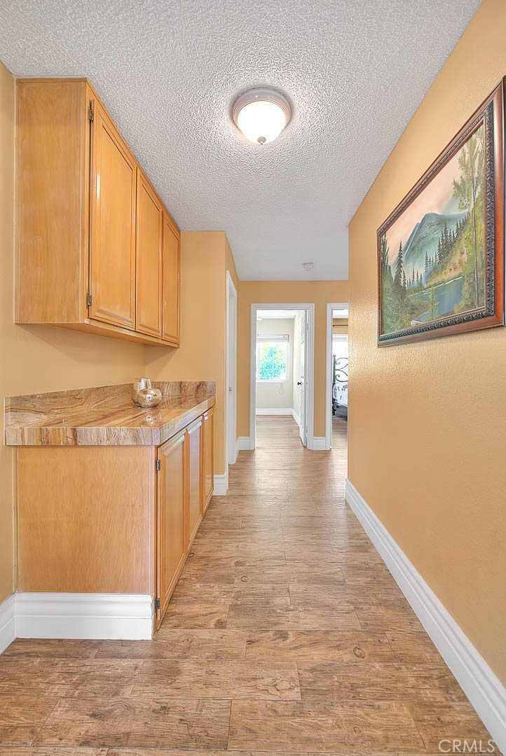 3340 May Court Riverside, CA 92503 - Photo 30 of 67 a view of a kitchen with a sink and dishwasher
