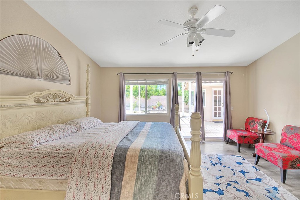 3340 May Court Riverside, CA 92503 - Photo 42 of 67 a bedroom with a bed couch and a window