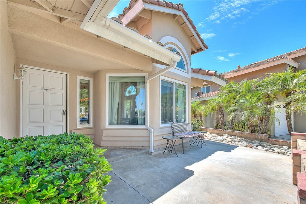 3340 May Court Riverside, CA 92503 - Photo 5 of 67 a view of a patio with table and chairs and potted plants