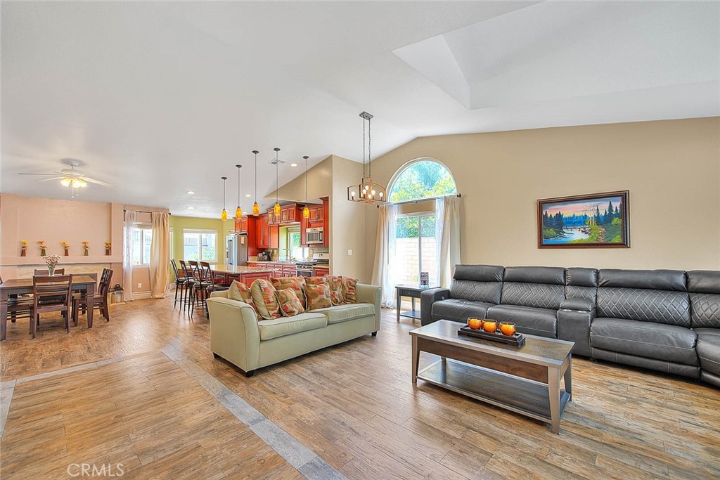 3340 May Court Riverside, CA 92503 - Photo 6 of 67 a living room with furniture wooden floor and a large window