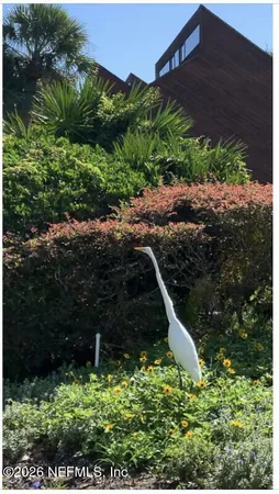 a view of statue in a garden