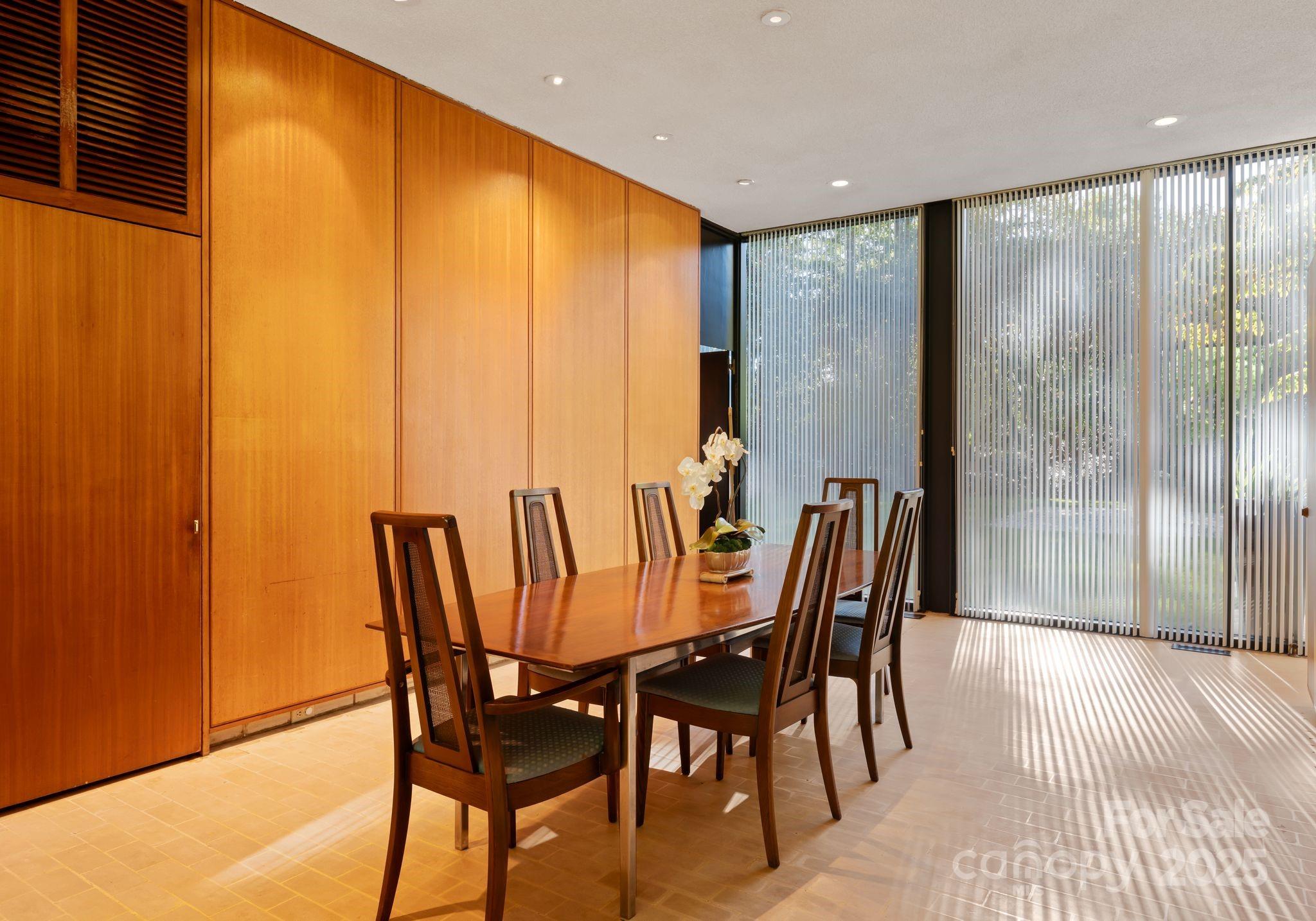 9331 Providence Road Charlotte, NC 28270 - Photo 16 of 40 a view of a dining room with furniture window and outside view