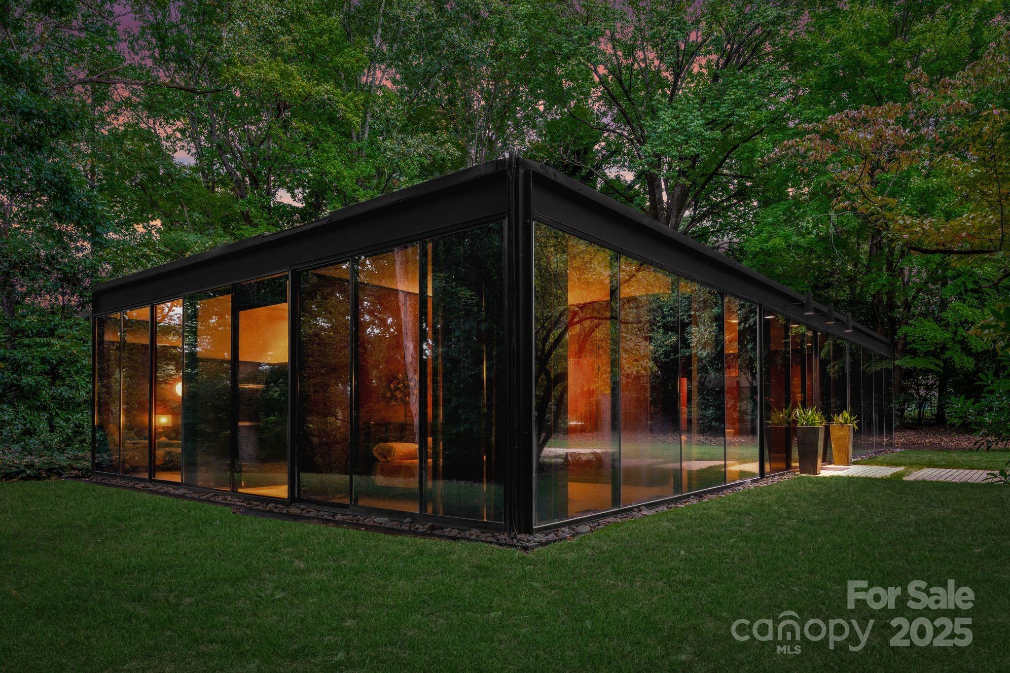 9331 Providence Road Charlotte, NC 28270 - Photo 2 of 40 a view of outdoor space with garden