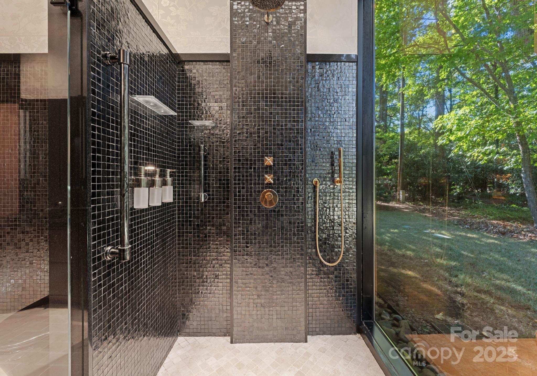9331 Providence Road Charlotte, NC 28270 - Photo 23 of 40 a bathroom with a shower