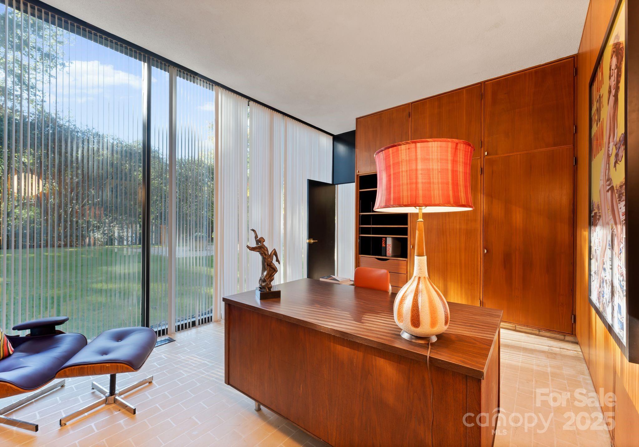 9331 Providence Road Charlotte, NC 28270 - Photo 29 of 40 a dining room with a table and chairs
