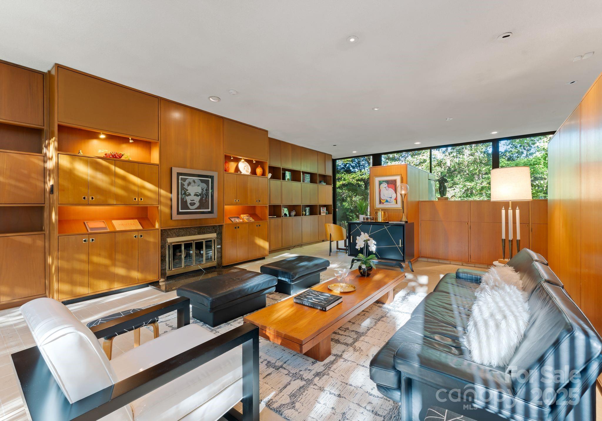 9331 Providence Road Charlotte, NC 28270 - Photo 6 of 40 a living room with furniture kitchen view and a large window