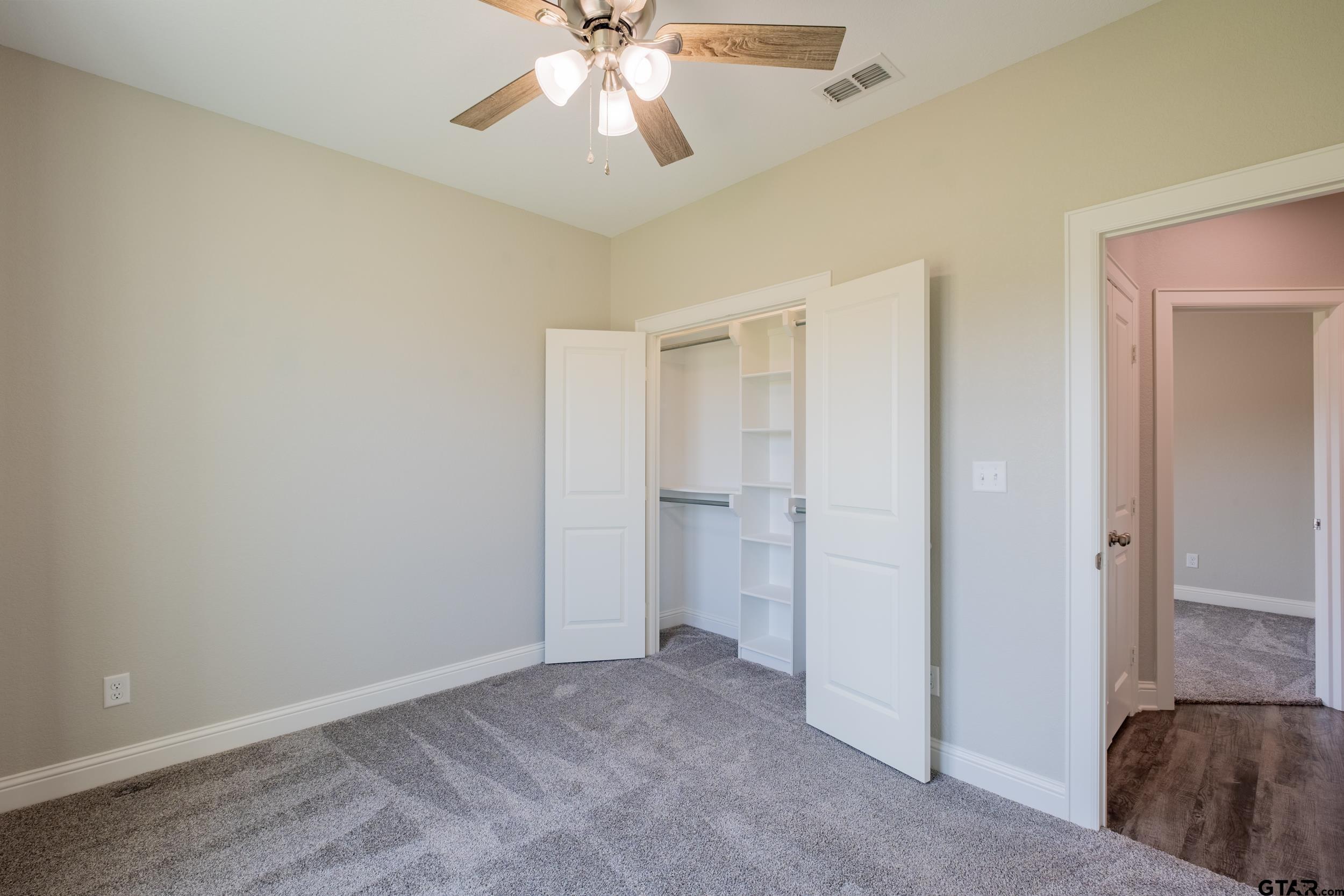 14348 County Road 452 Lindale, TX 75771 - Photo 25 of 45 a view of a livingroom with a chandelier fan