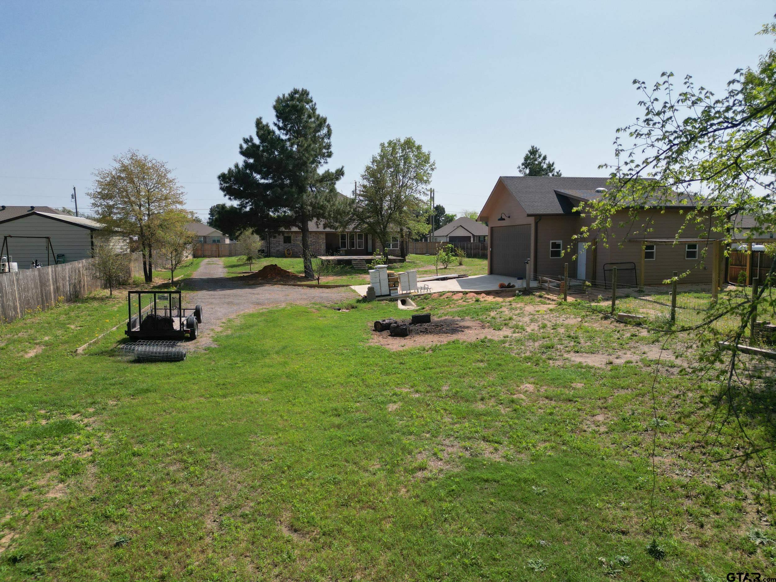 14348 County Road 452 Lindale, TX 75771 - Photo 35 of 45 a view of a house with backyard porch and sitting area