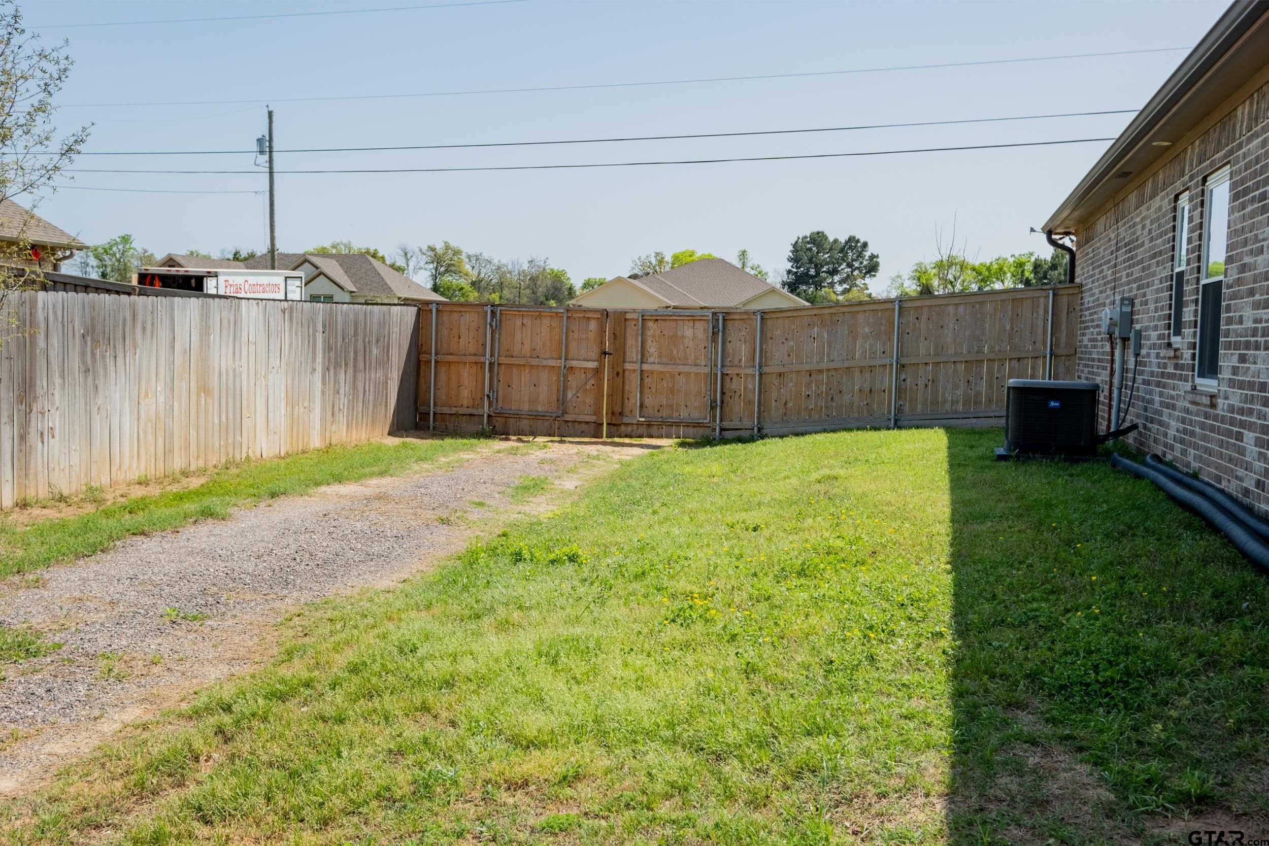 14348 County Road 452 Lindale, TX 75771 - Photo 37 of 45 a view of a backyard with wooden fence