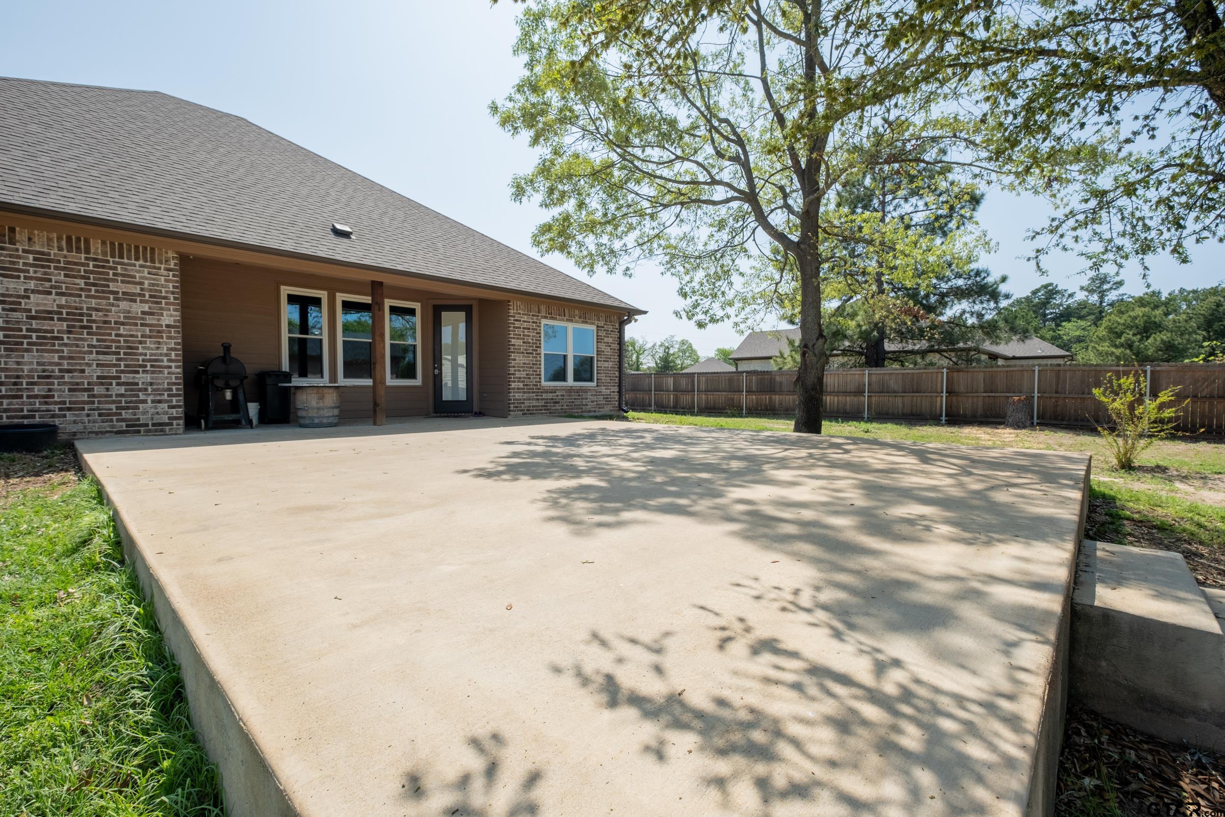 14348 County Road 452 Lindale, TX 75771 - Photo 38 of 45 a view of a house with a yard covered in snow