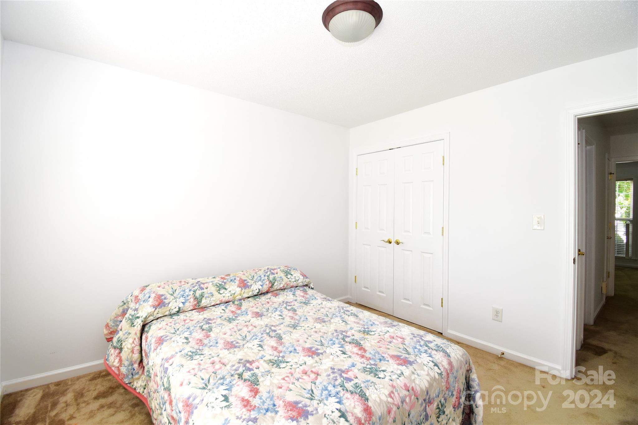 65 Cottage Ridge Road Fletcher, NC 28732 - Photo 23 of 40 a bedroom with a bed and a window
