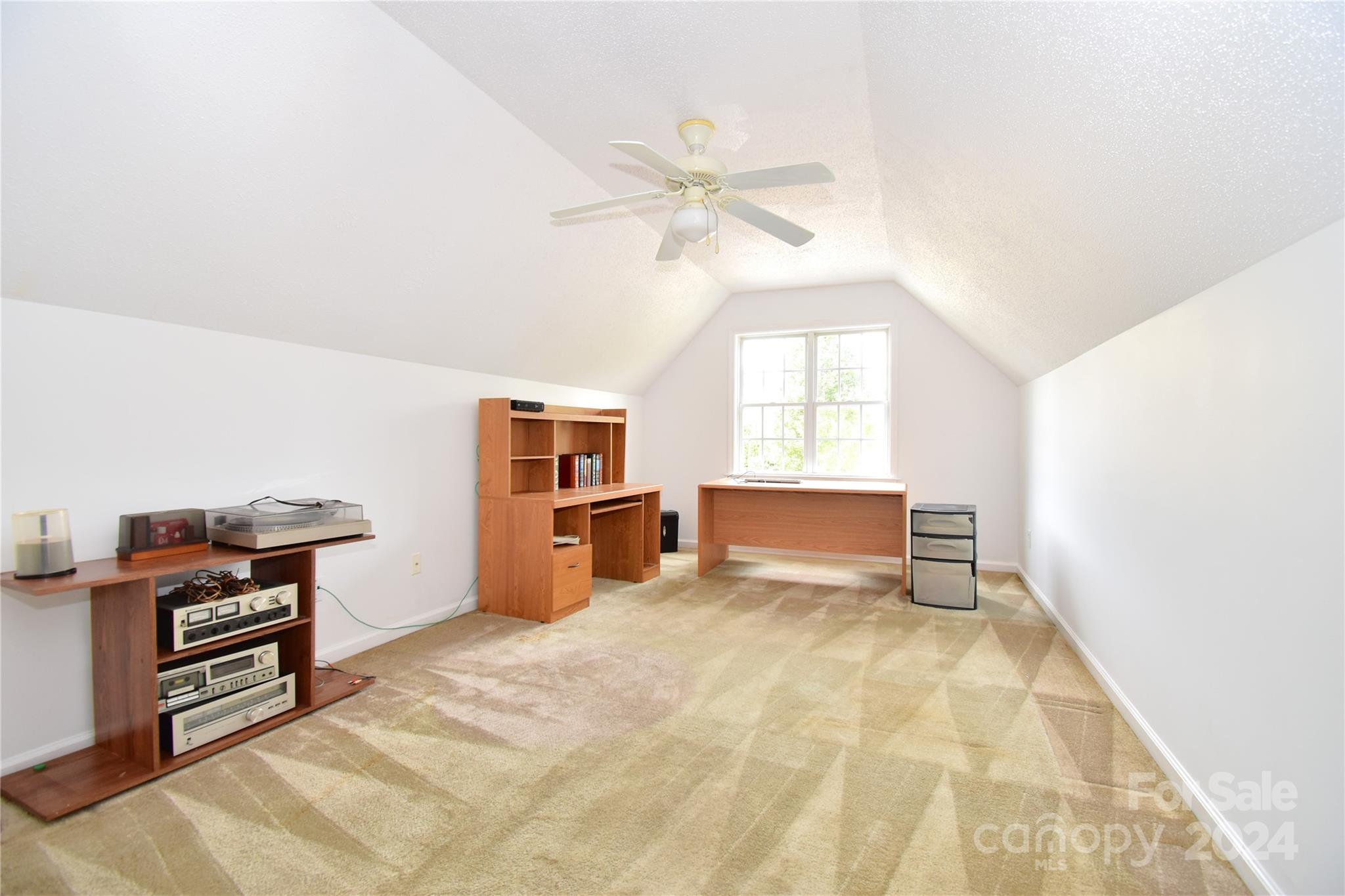 65 Cottage Ridge Road Fletcher, NC 28732 - Photo 25 of 40 a view of a workspace with furniture and a window
