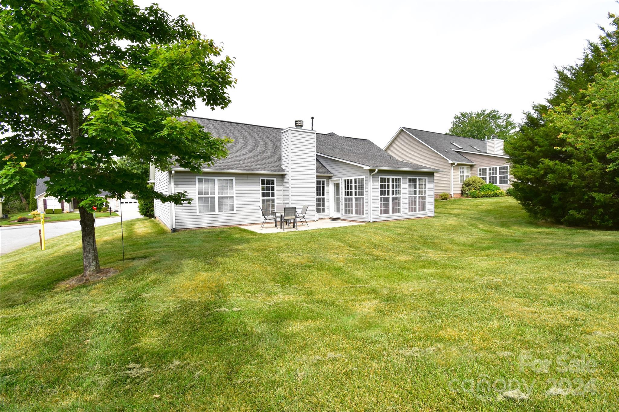 65 Cottage Ridge Road Fletcher, NC 28732 - Photo 33 of 40 a front view of a house with a garden