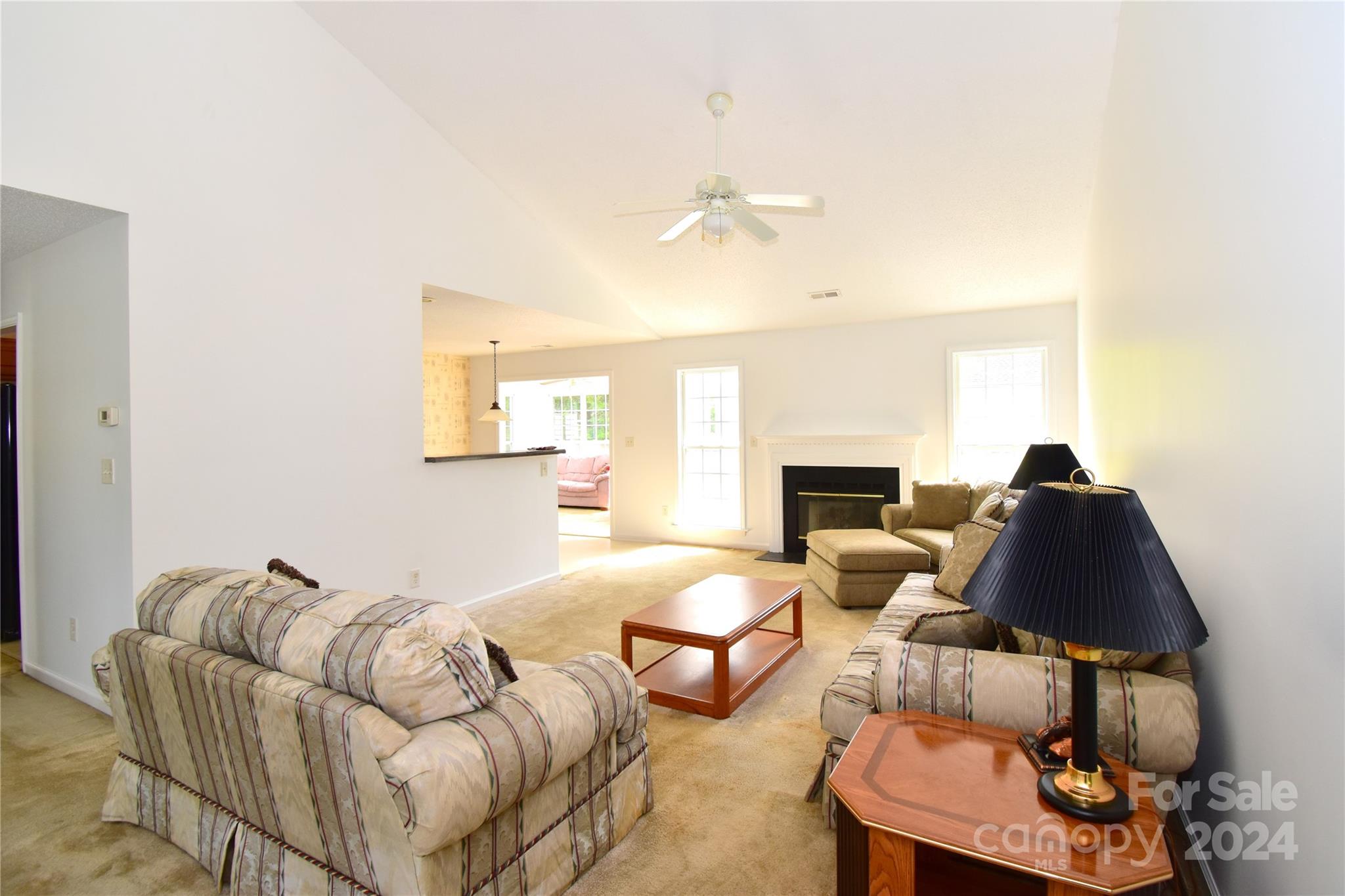 65 Cottage Ridge Road Fletcher, NC 28732 - Photo 4 of 40 a living room with furniture and a fireplace
