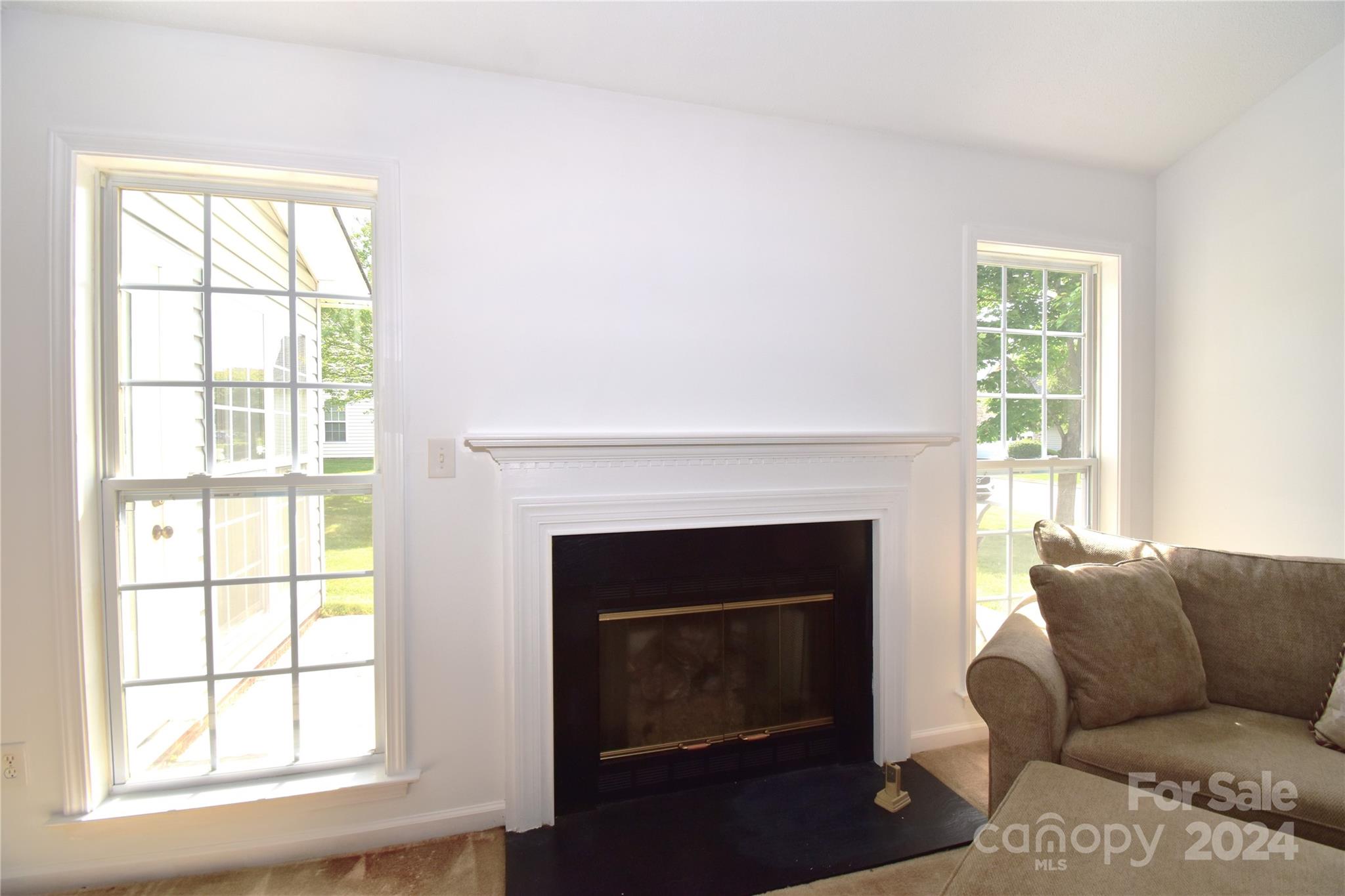 65 Cottage Ridge Road Fletcher, NC 28732 - Photo 5 of 40 a living room with furniture and a fireplace