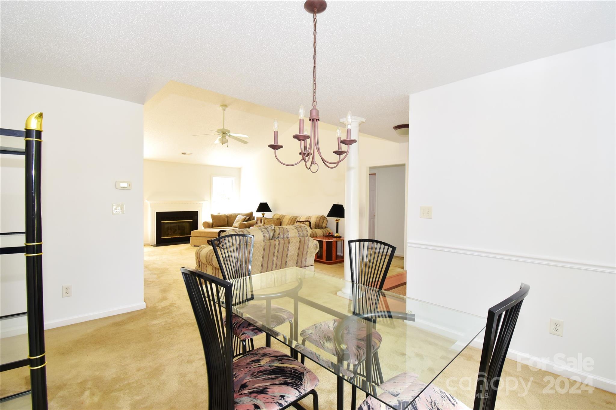 65 Cottage Ridge Road Fletcher, NC 28732 - Photo 8 of 40 a view of a dining room with furniture and chandelier