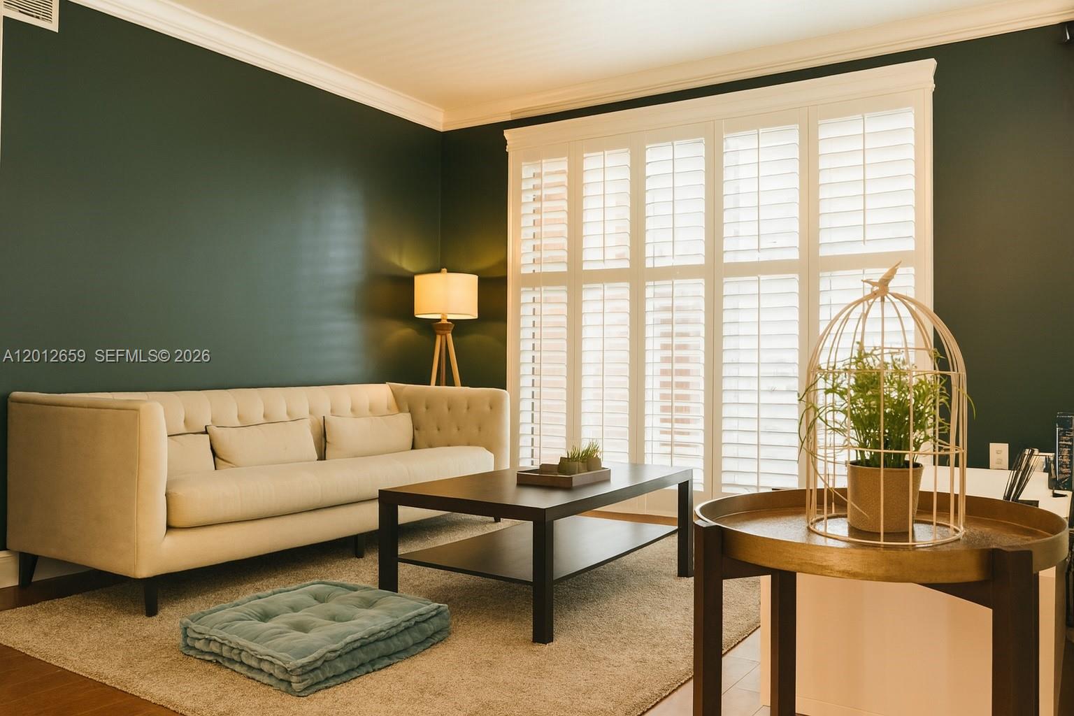 7355 Southwest 89th Street, Unit 501N Miami, FL 33156 - Photo 1 of 21 a living room with furniture and a window