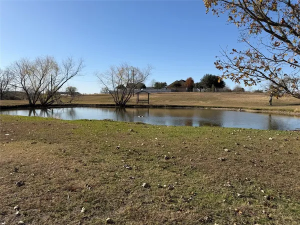 a view of a lake with a mountain in the background