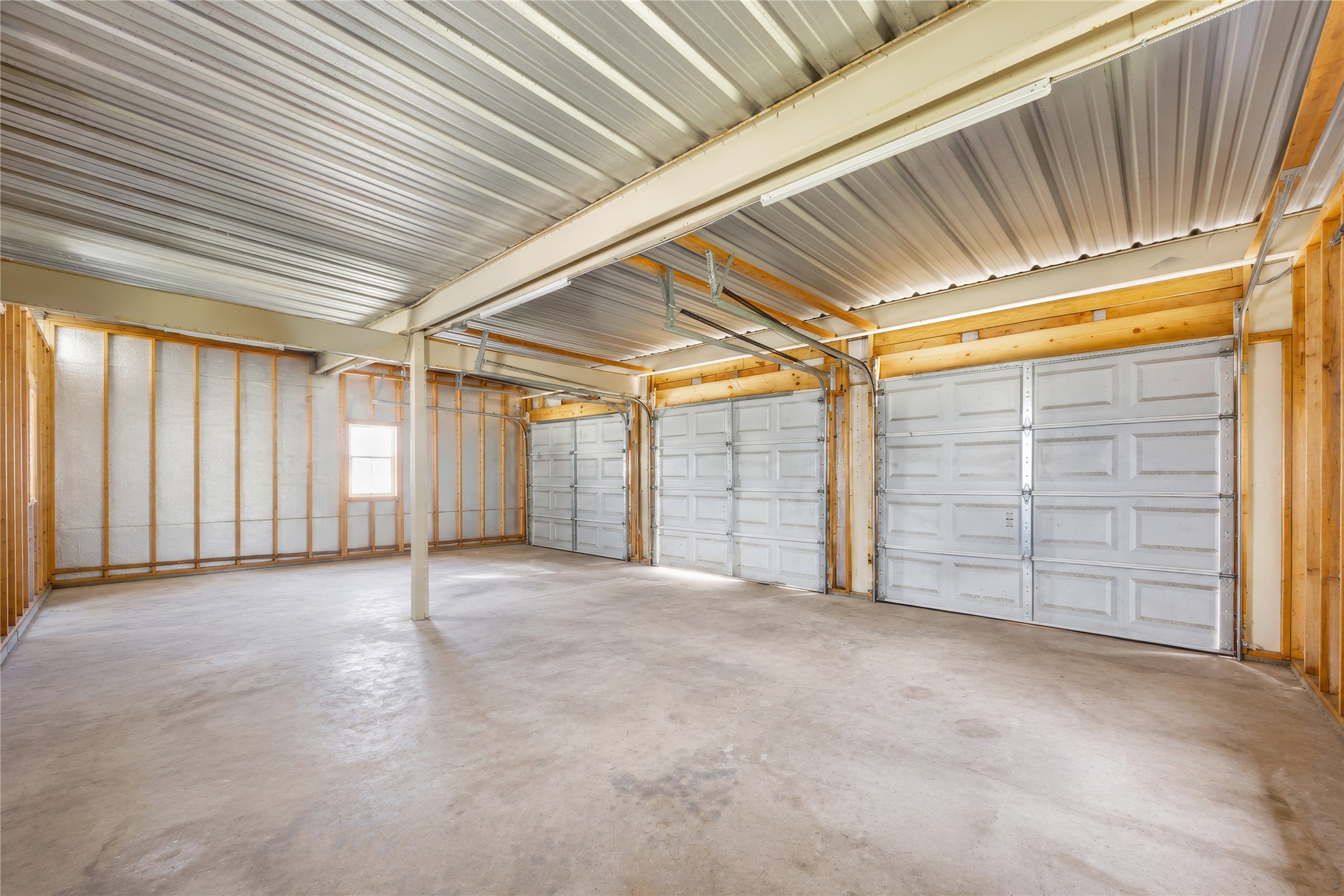 1283 Rattlesnake Trail Burnet, TX 78611 - Photo 11 of 39 a view of an empty room with garage