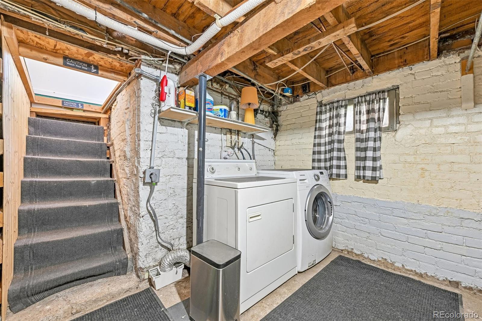 3275 Perry Street Denver, CO 80212 - Photo 19 of 38 a utility room with dryer and washer
