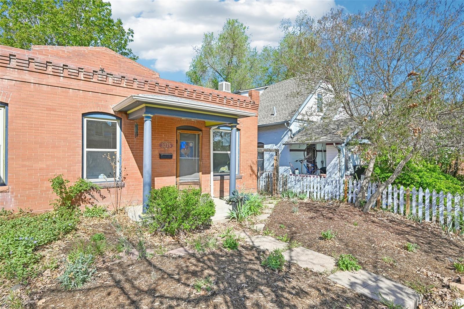 3275 Perry Street Denver, CO 80212 - Photo 2 of 38 a view of a house with a yard