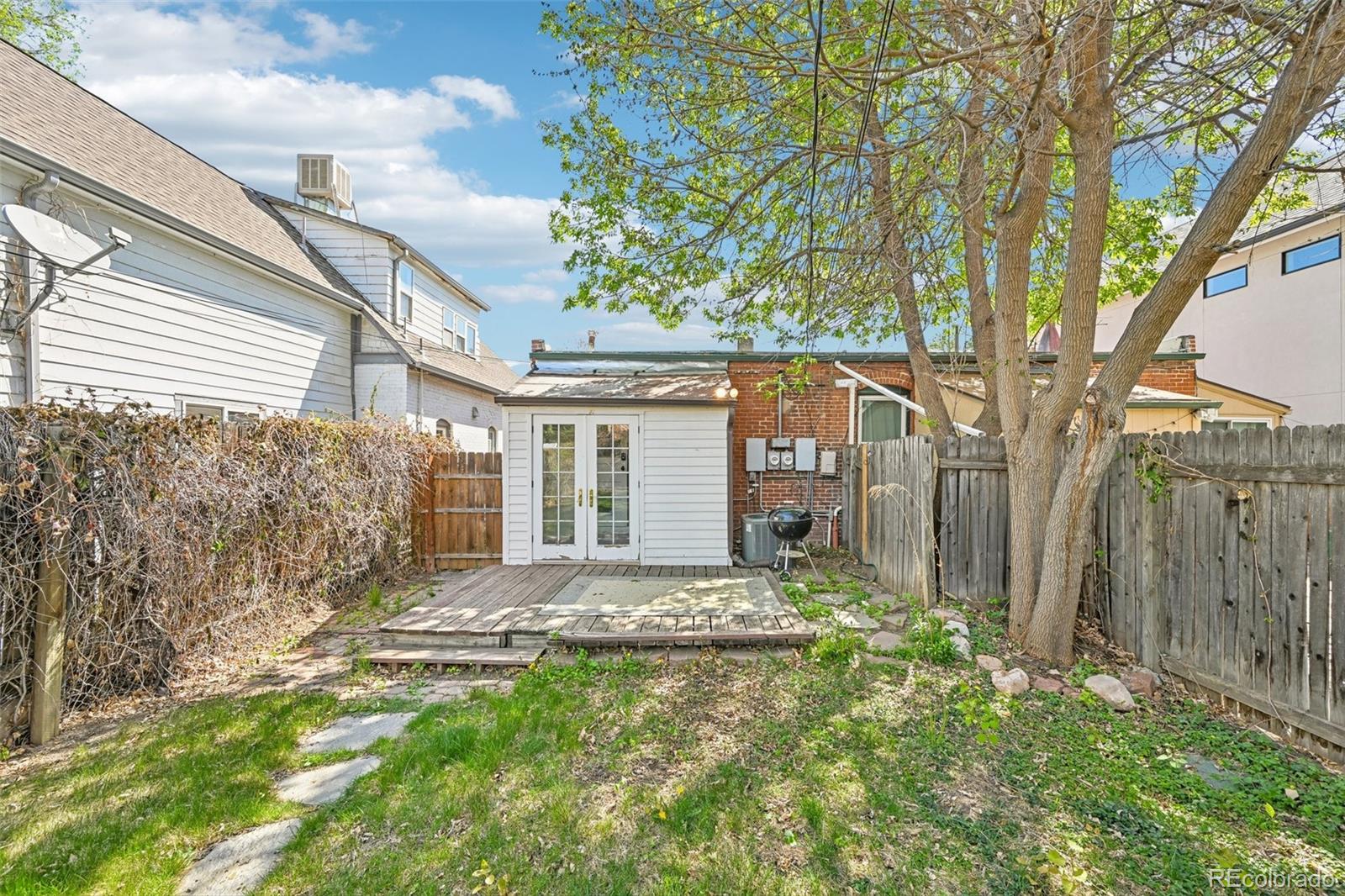 3275 Perry Street Denver, CO 80212 - Photo 22 of 38 a view of a house with a yard
